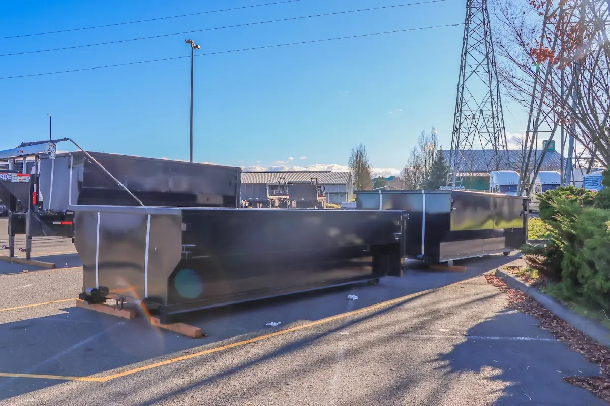Roll-off dumpster ready for waste disposal at job site for Yard Waste Dumpster Rental in Radford